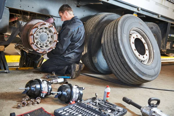 depositphotos 314465730 stock photo truck repair service mechanic works